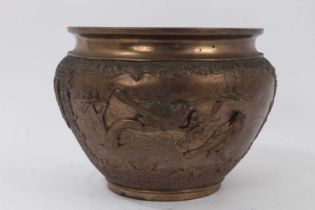 Japanese bronze patinated bowl, decorated with birds and flowers in relief, 17.5cm high