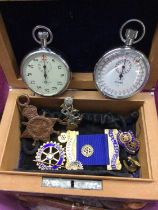 Group of coins, two stopwatches, WWI medal, Rotary medal and pins