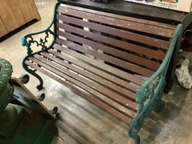 Cast iron and slatted wood garden bench, 126.5cm wide