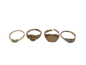 Four 18ct gold rings including two diamond set