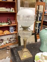 Edwardian brass oil lamp with cut glass reservoir