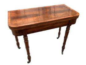 Regency rosewood and brass inlaid card table