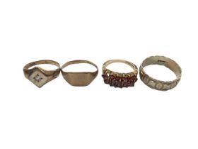 Four 9ct gold rings to include two signet rings, garent cluster and a white gold wedding band