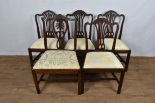 Set of four George III mahogany dining chairs in the Hepplewhite style