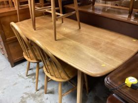 Set of four Ercol stick back chairs and an Ercol dining table