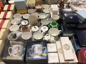 Collection of Royal commemorative mugs, plated, trinket boxes, glass paperweights etc and a Royal Wo