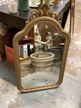 Four framed wall mirrors