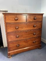 Victorian mahogany chest of two short and three long drawers with bun handles