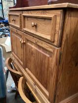 Pine sideboard with two drawers and cupboards below, together with a small pine two door cupboard (2