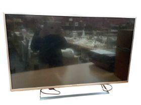 42" Panasonic LCD TV together with remote control and instruction