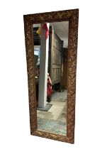 Victorian-style gilt framed narrow mirror with foliate design