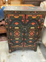 Chinese lacquered cabinet with shelved interior enclosed by two doors, 61.5cm wide, 31cm deep, 92cm