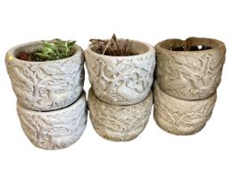 Six concrete garden planters, 23cm high