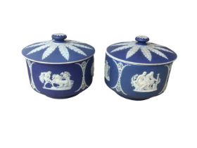 Pair of Wedgwood dark blue jasperware covered bowls, decorated with classical scenes, impressed mark