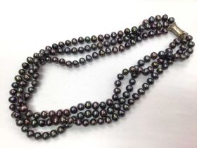 Hong Kong black cultured pearl three strand necklace