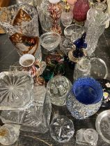Large quantity of Georgian and later glass decanters, vases, paperweights etc.