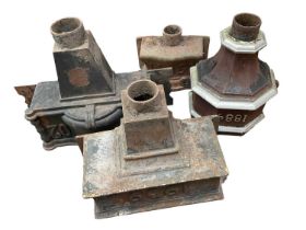 Four cast iron dated water hoppers