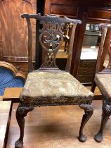 Two George III style carved walnut side chairs