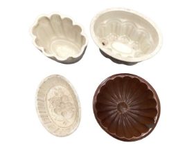 Four Victorian stoneware jelly moulds / Capodimonte cup and saucer, Limoges coffee can and saucer, C