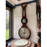 Two barometers, together with a drop dial wall clock and a regulator wall clock.