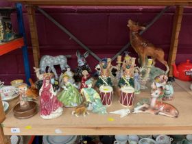 Group of ceramic figures, including Royal Doulton, Beswick, etc