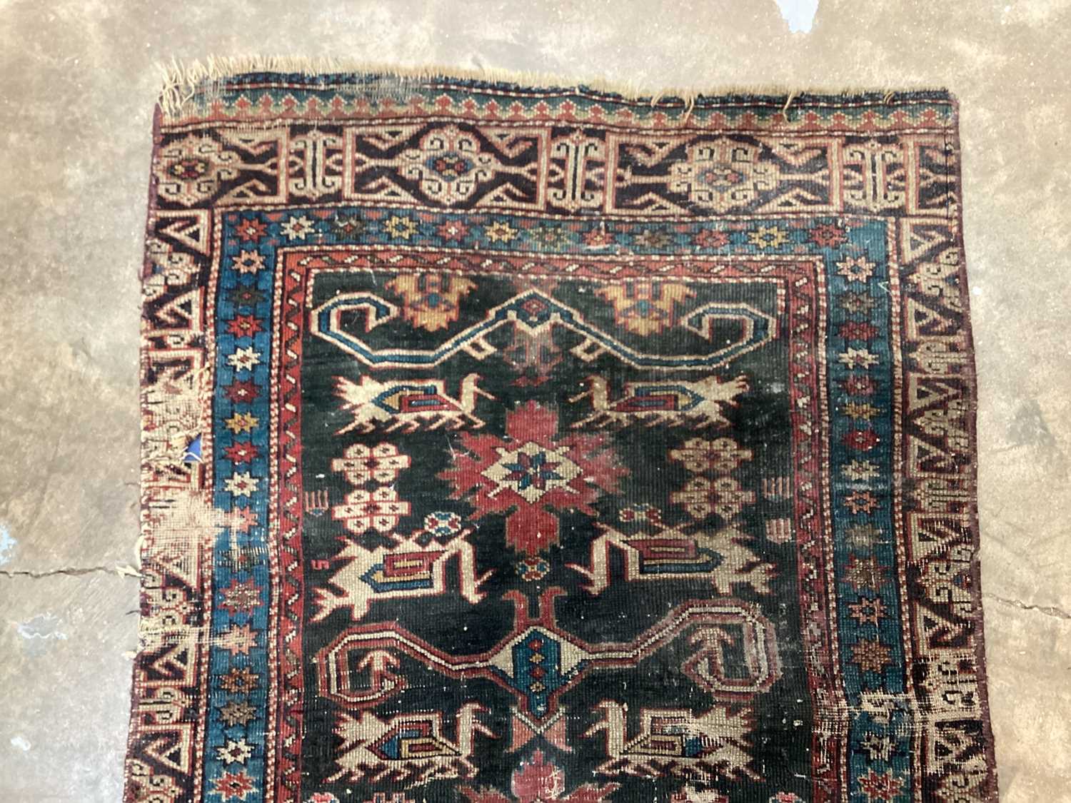 Eastern rug with geometric decoration on red, blue and black ground, 135cm x 72cm - Image 4 of 5