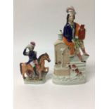 Staffordshire pottery figure of a Highlander with a spaniel at a well, and another of a figure on ho