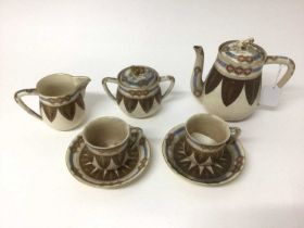 19th century Japanese Satsuma two-person tea set, with foliate and other patterns, four-character ma