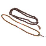 Two large Tibetan simulated and reconstituted amber prayer bead necklaces