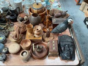 Group of treen items to include Puffin, barley twist candlesticks, nut cracker and other items.