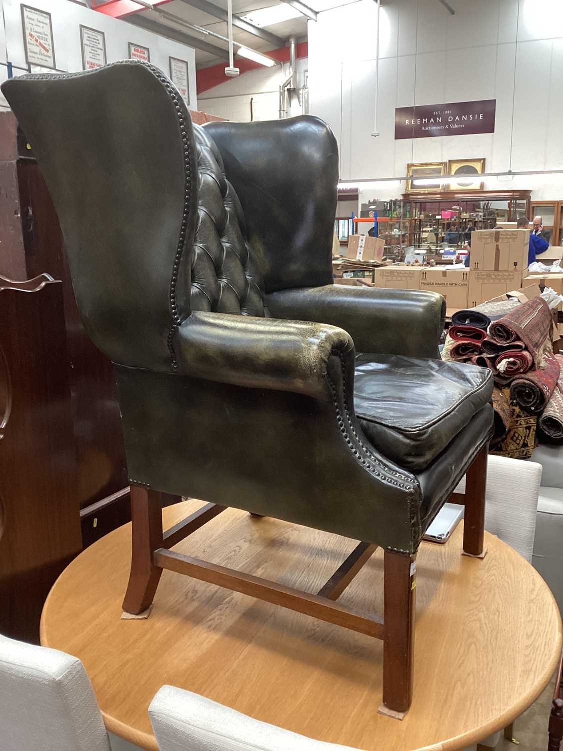 Georgian-style buttoned green leather wing chair on chamfered legs - Image 2 of 2