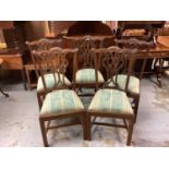 Set five mahogany Chippendale revival dining chairs with carved and pierced splat backs