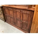 Eastern hardwood cupboard with four panelled doors