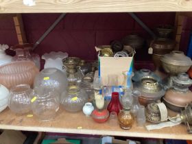 Collection of oil lamp parts, shades, burners etc