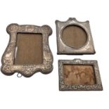 Three antique silver photograph frames