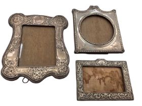 Three antique silver photograph frames