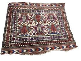 Eastern rug with geometric decoration on red, blue and cream ground, 120cm x 112cm