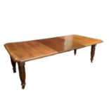 Large Edwardian oak extending dining table