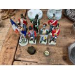 Group of seven porcelain military figures together with a Middle Eastern mother of pearl pill box an