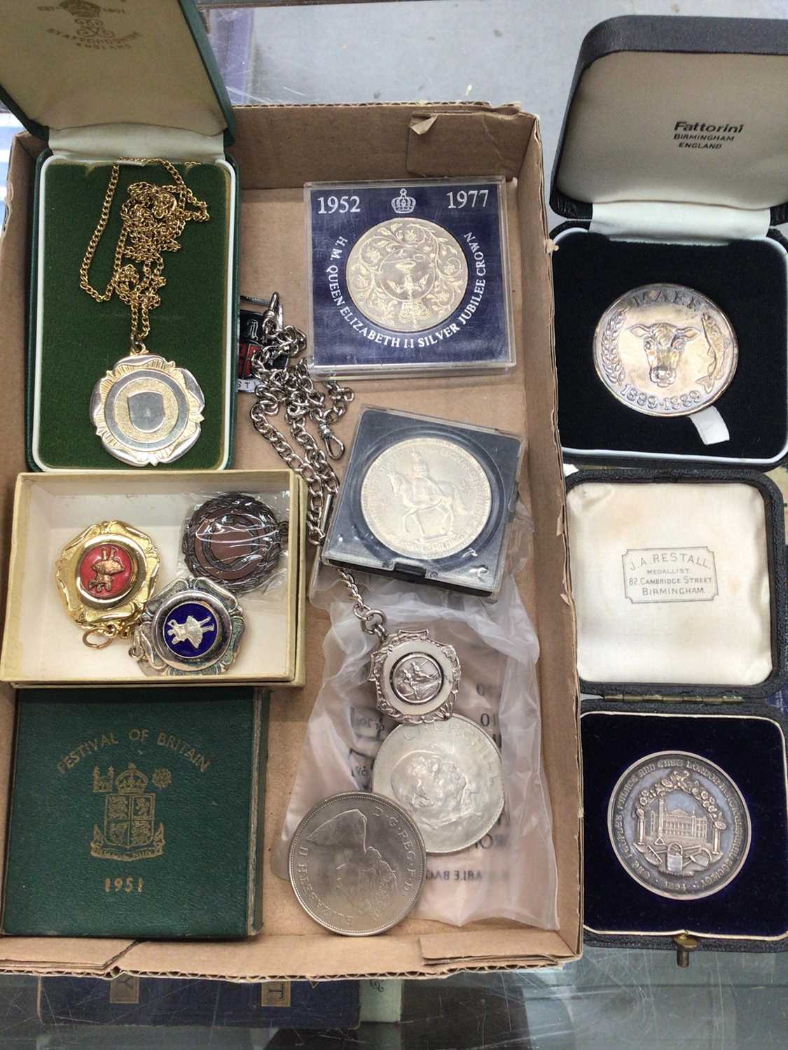 Two silver medallions in fitted cases, silver fob on plated chain, other fobs and coins