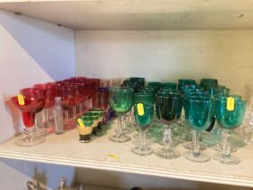 Collection of glassware including ruby, green, paperweights etc