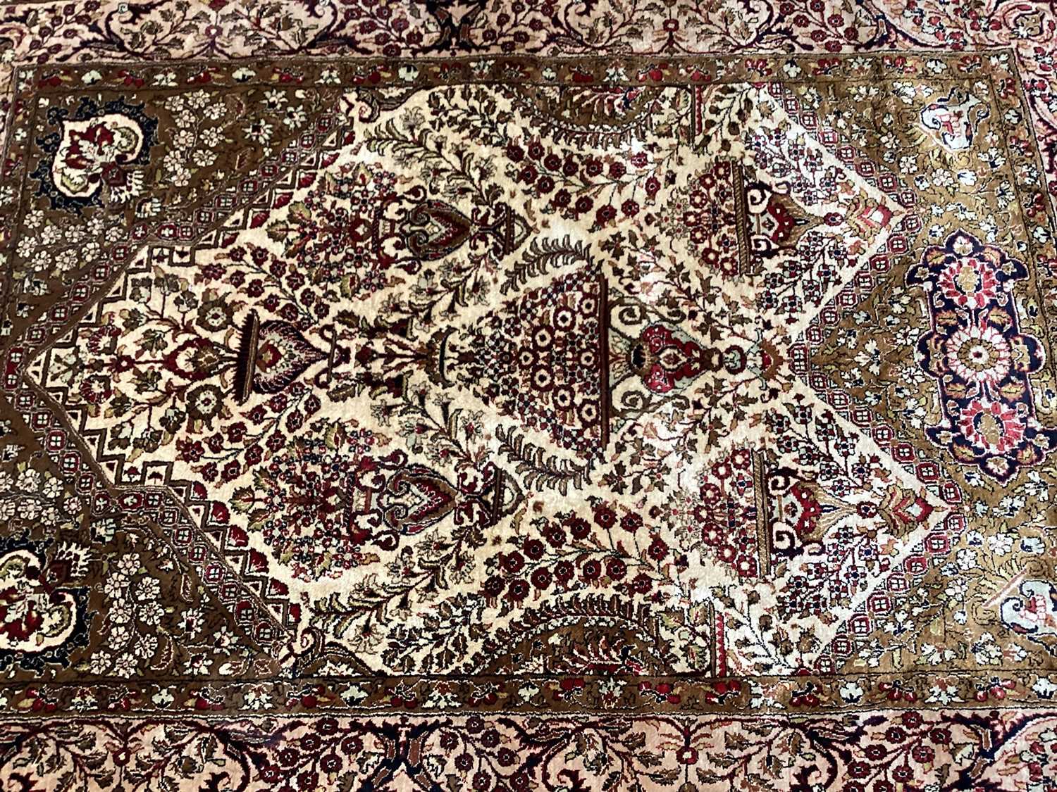 Eastern rug with floral decoration on red, cream and green ground, 154cm x 108cm - Image 2 of 3