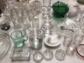 Group of glassware including a set of five art glass bowls, pair of hobnail cut glass decanters and