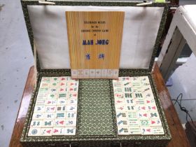 Mah jong set with bamboo and bone pieces in original fitted silk covered case