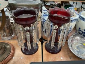 Pair of 19th century ruby glass lustres with prismatic drops.