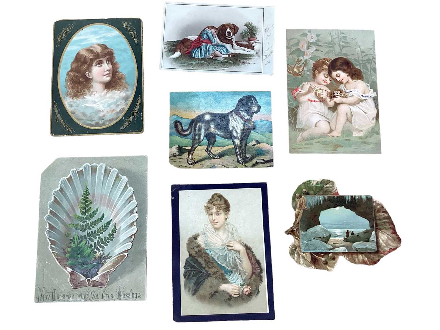 Chromolithographs in album including children, animals etc.