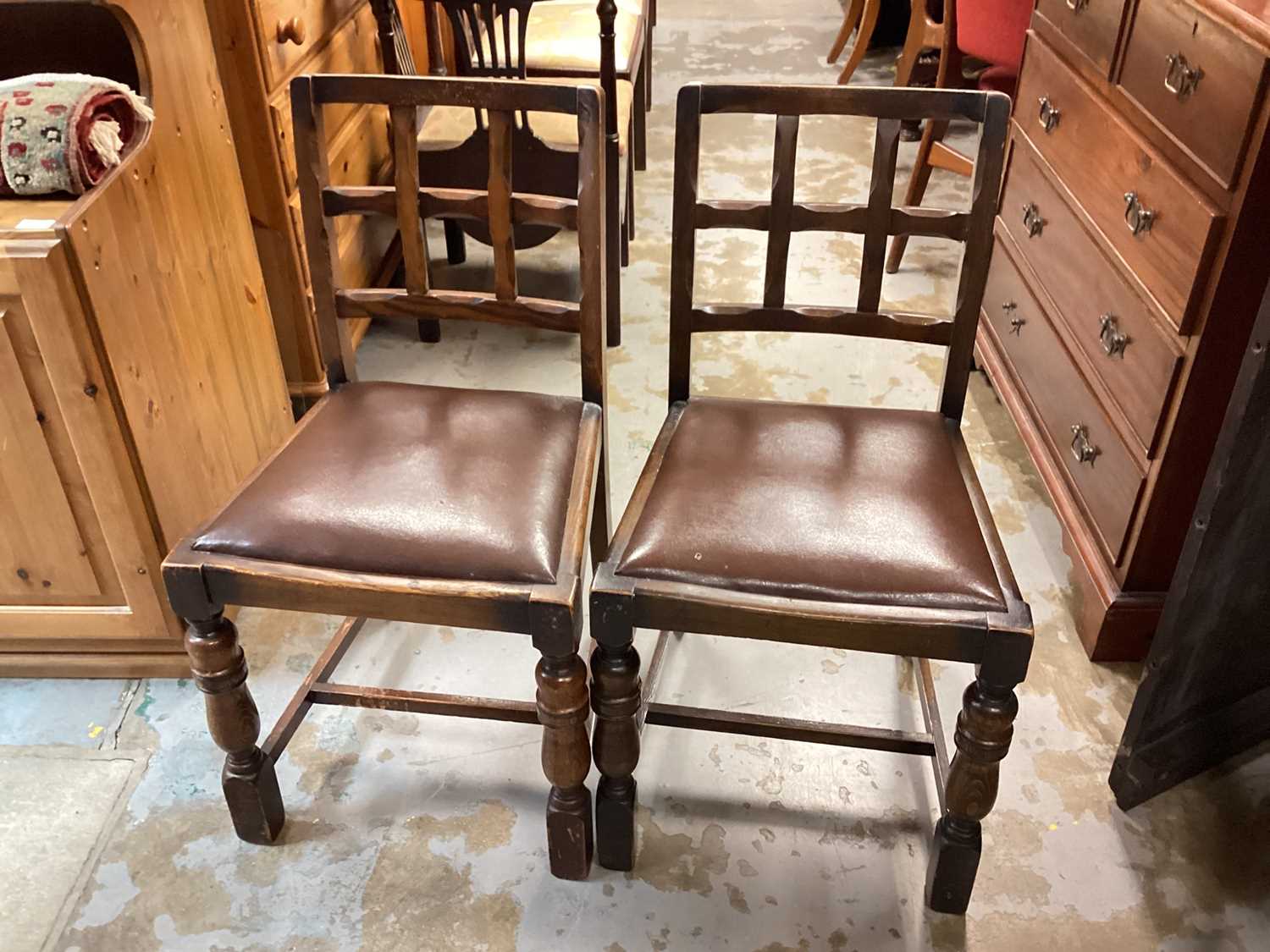 Pair of oak dining chairs with drop in seats