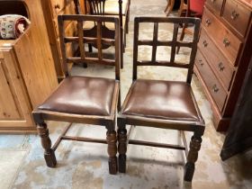 Pair of oak dining chairs with drop in seats