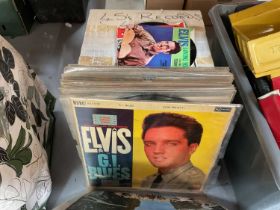 Group of LP's and singles to include Elvis and Dean Martin