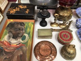 African oil painting of a tribal woman, old brass oil lamp with cranberry glass shade, Victorian kit